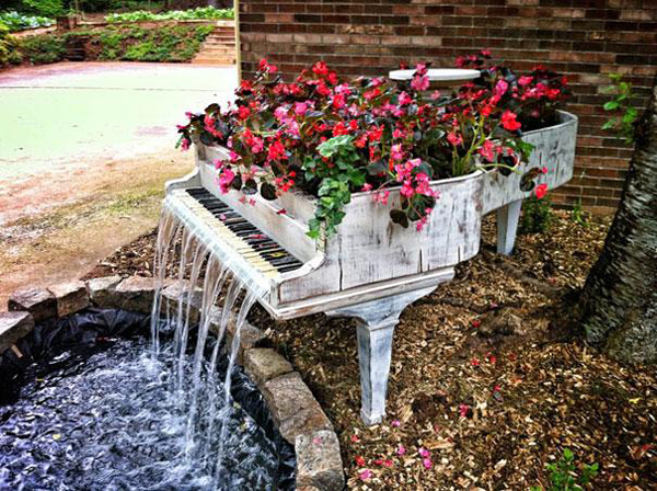 19.) Found another old piano? Turn it into a planter/outdoor fountain.